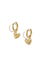 Earrings with a detailed dangling heart